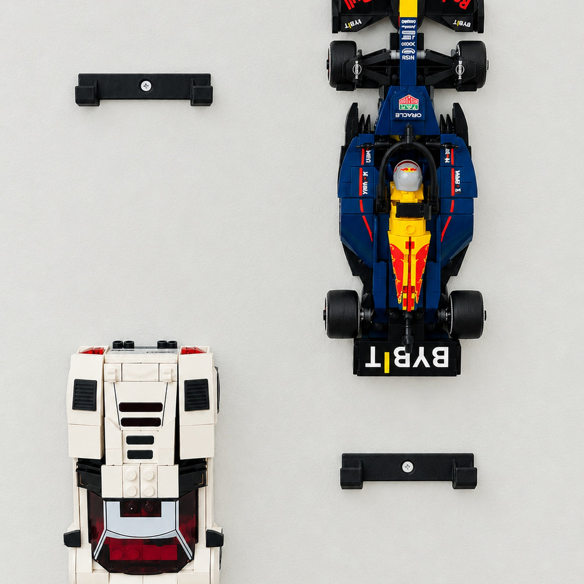 Speed Champions cars displayed on wall with black wall mount