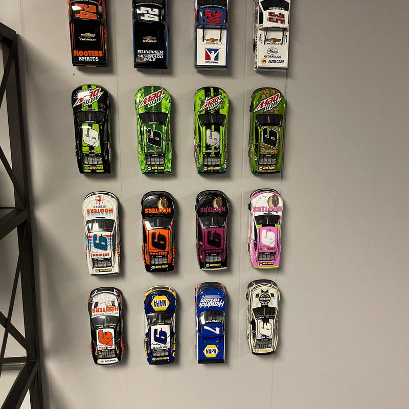 Etsy review photo: 1:24 diecast F1 cars on wall mounts (Joseph)
