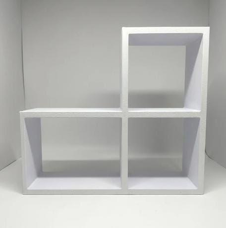 Empty white mini vinyl display stand showing the player platform and three open slots